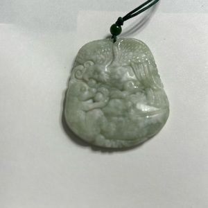 Eagle and bear white jade pendant